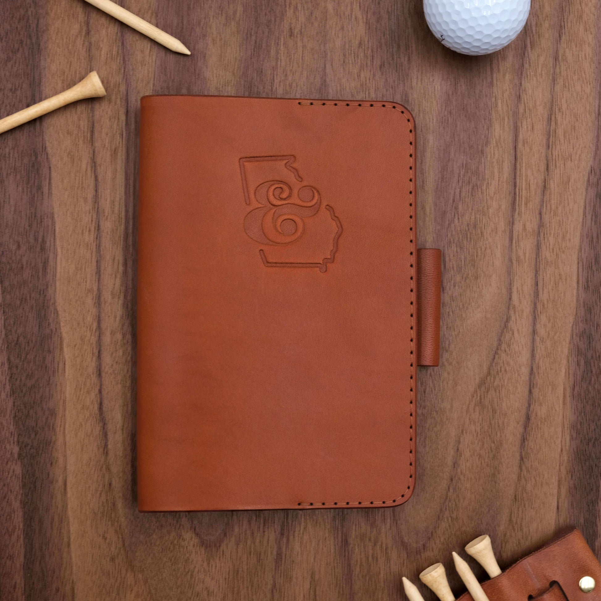 Woolly Made Golf Scorecard Holder with a debossed logo.