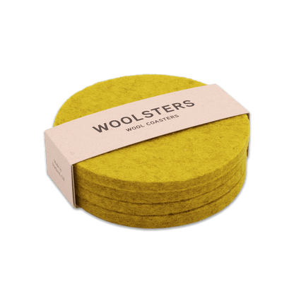 Yellow wool round coaster set stacked.